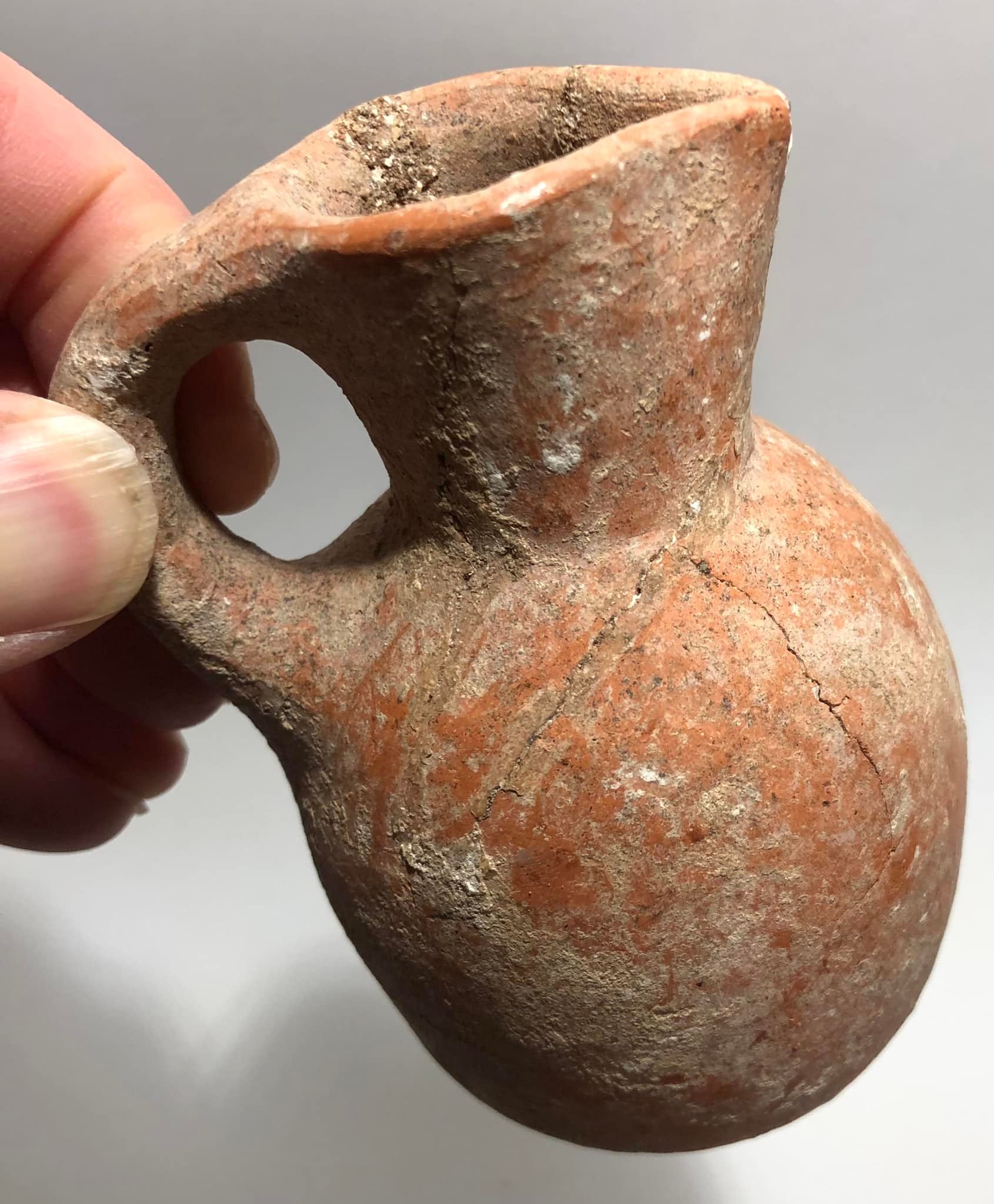 Bronze Age juglet with handle and round base